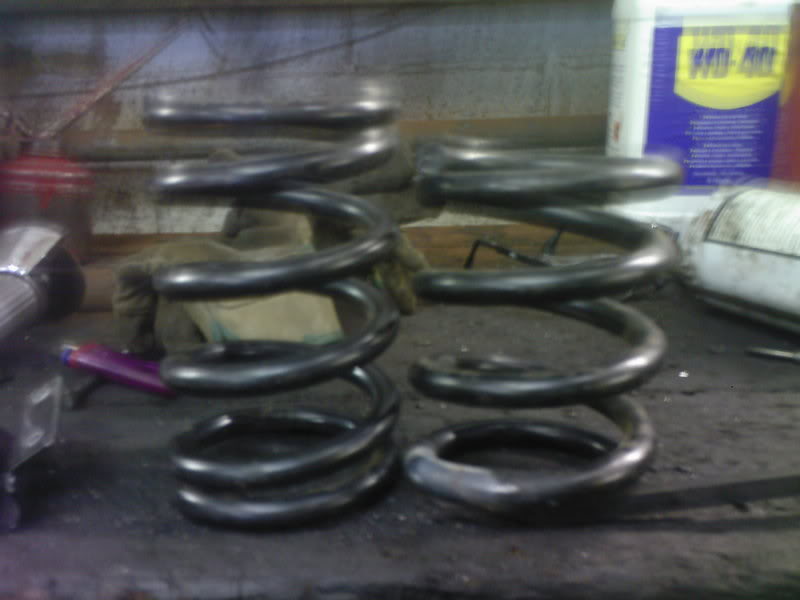 lowering springs bent with oxy-acetelene