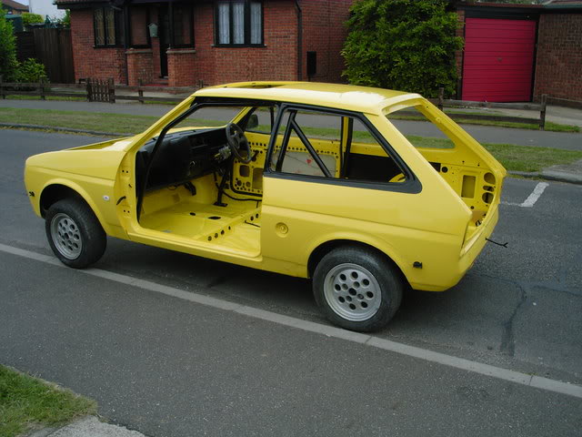 black and zinc yellow Ford Fiesta bodyshell