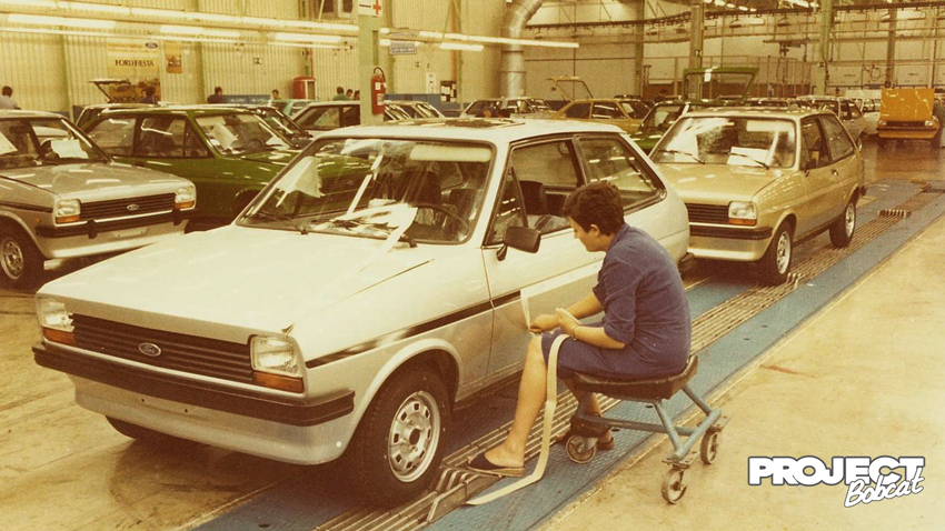 Ford Fiesta side stripes being applied by a factory worker