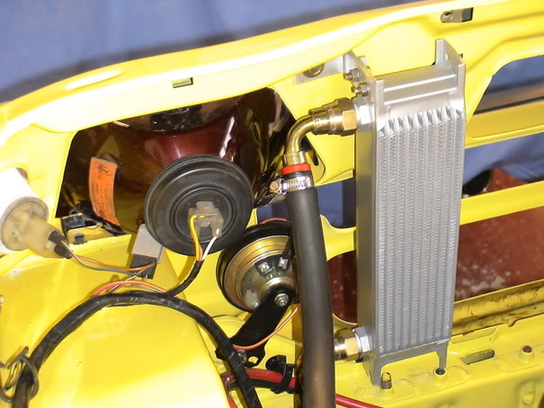 Vertically mounted oil cooler